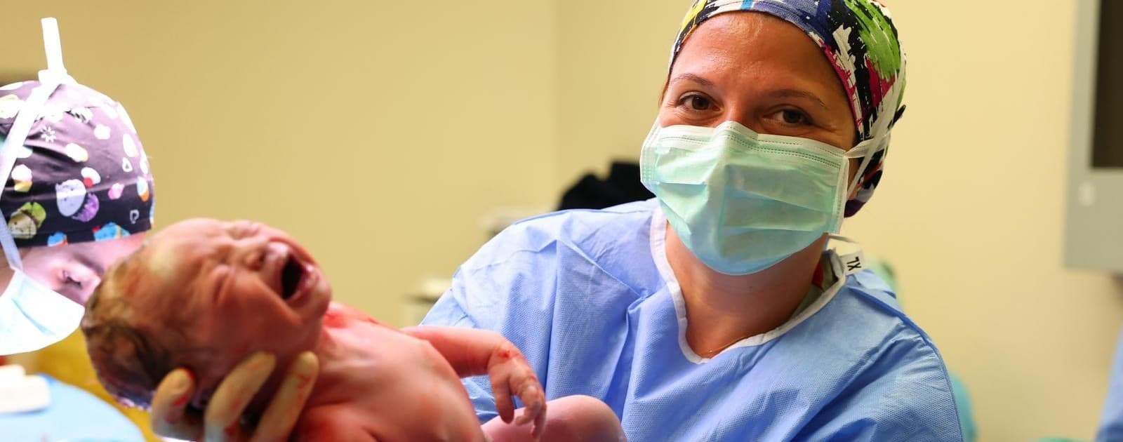Mother and baby themed clinic visual